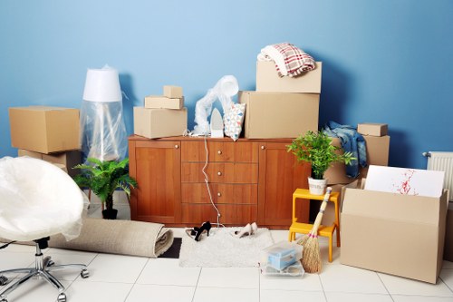 Commercial moving crew handling office furniture and equipment for a local move