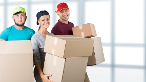 Packed moving boxes and furniture protection for a home removal in West Hampstead