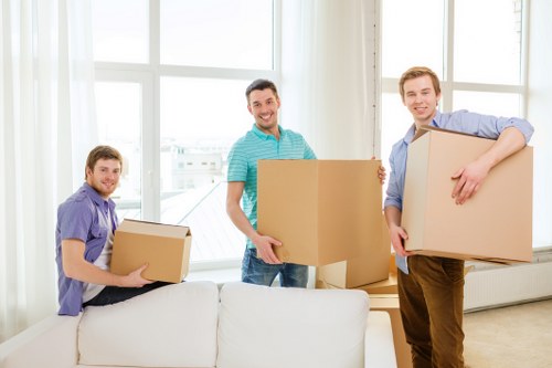 Commercial office moving team handling desks and IT equipment in Westhampstead