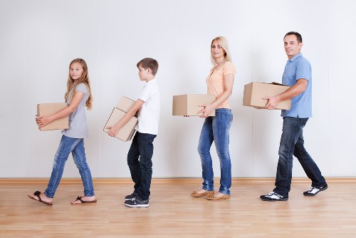 Local office movers preparing equipment for a Westhampstead business relocation