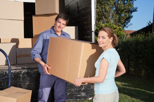 Packed office furniture and documents ready for relocation in Westhampstead